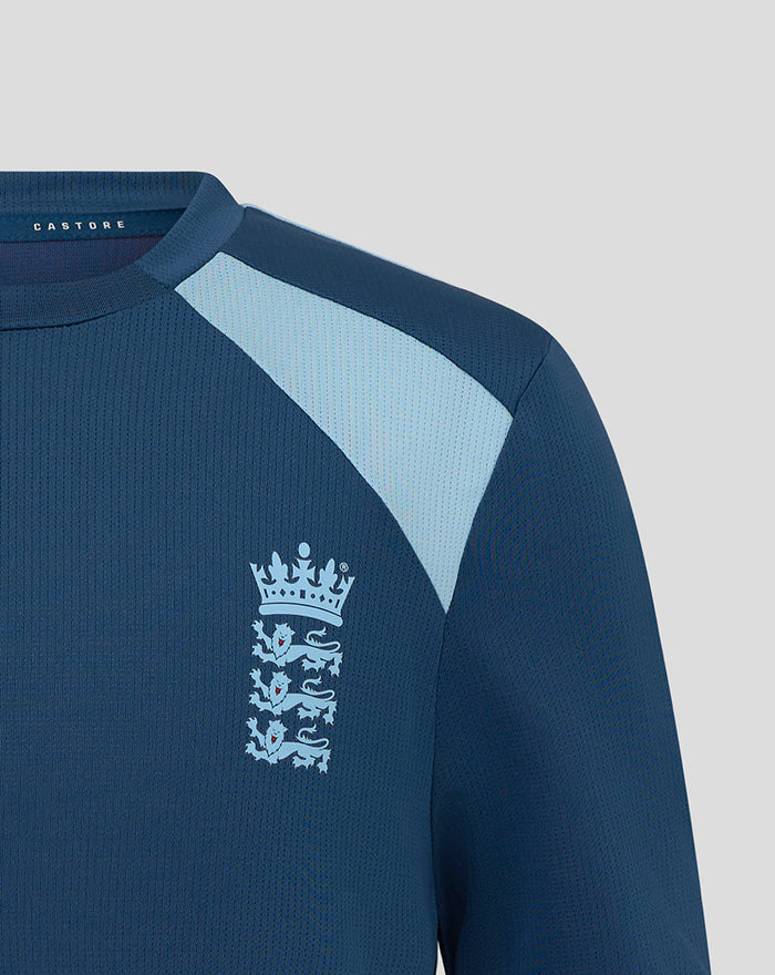 Shoulder view of blue training jersey featuring England crest and Castore label