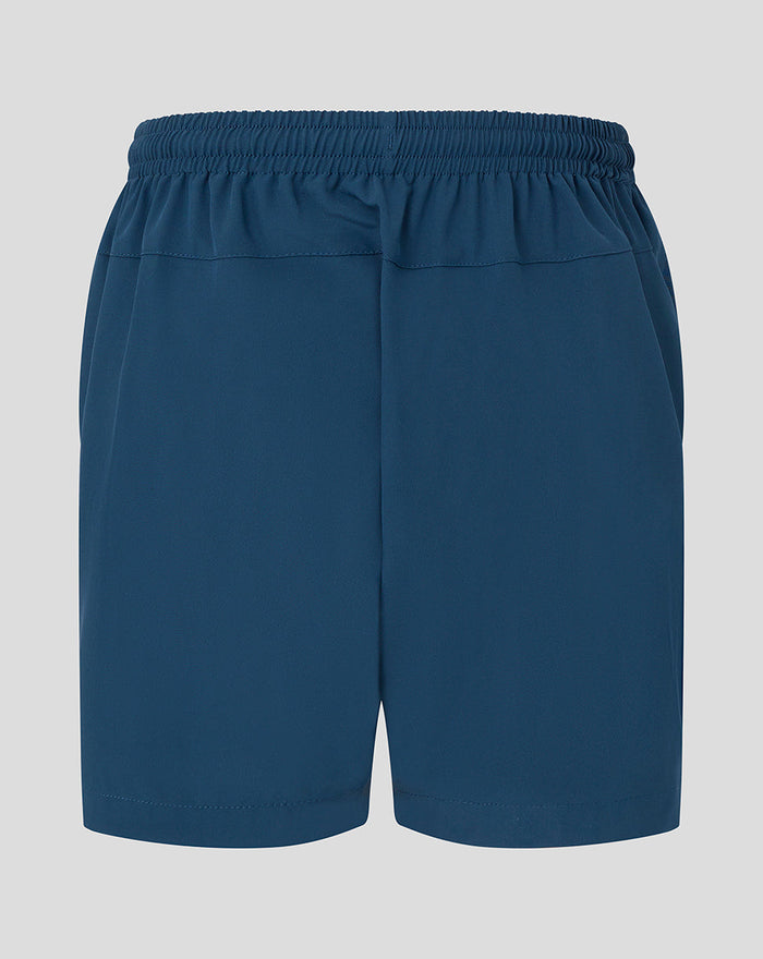 Back view of blue Junior 26/27 Training Shorts with an elastic waistband.
