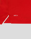Close-up of red fabric featuring the AERTEK branding on the T20 Pro shirt.