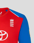 Red T20 sweater chest with the Three Lions crest on the left and a blue sleeve visible