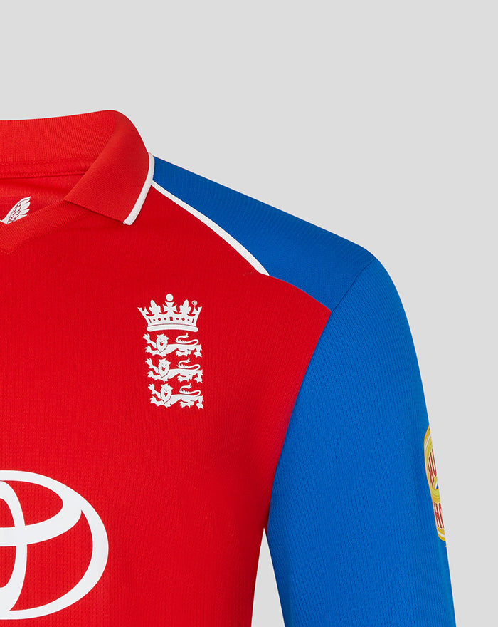 England T20 long sleeve cricket shirt in red with blue shoulders, featuring a chest crest and Toyota logo.