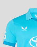 Bright blue ODI Pro short sleeve cricket shirt close-up showing Castore logo and Toyota sponsor.