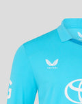 Close up of blue ODI shirt chest showing the Three Lions crest and CASTORE branding near the collar.