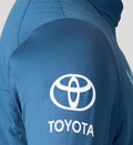 Ensign Blue training thermal jacket sleeve with large white Toyota logo.
