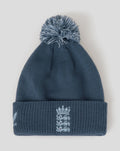 Blue bobble hat with fluffy pom-pom and embroidered Three Lions crest on the cuff