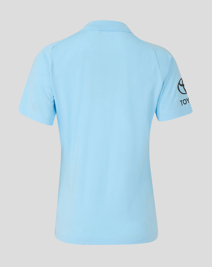 Back view of airy blue Travel Polo showing ribbed collar and sleeve branding