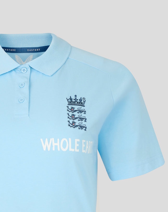 Close up of a light blue travel polo collar with inside Castore label and crest visible