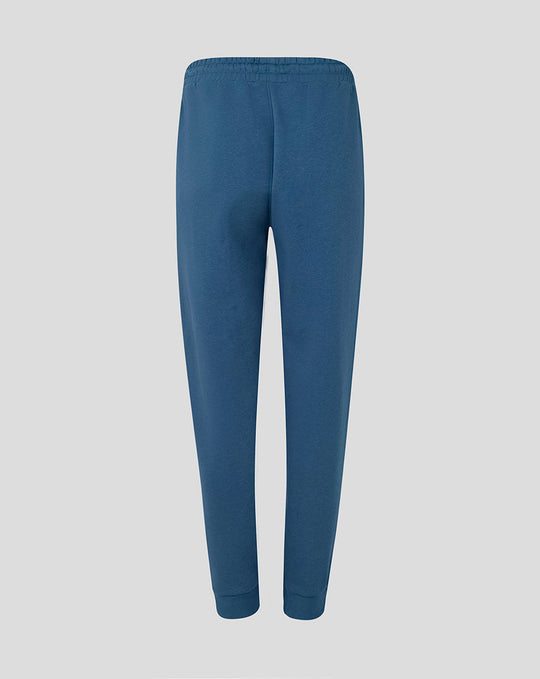 Back view of women's Ensign Blue Travel Adapt Fleece Joggers with elastic cuffs.