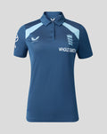 Front view of womens blue Training Poly Polo with light blue shoulder panels and a navy three lions crest.