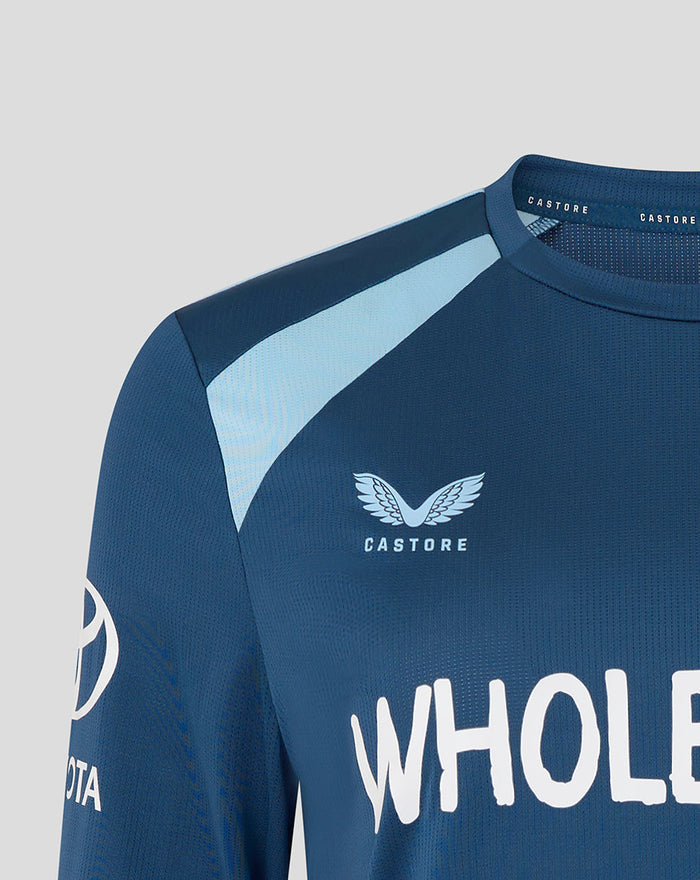 Close-up of the front chest showing Castore branding and bold white lettering across the shirt.
