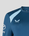 Close up of blue training sweatshirt showing Three Lions crest and Castore branding on the chest