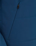 Detail of Ensign Blue Training Thermal Jacket fabric with diagonal zip and pull tab.