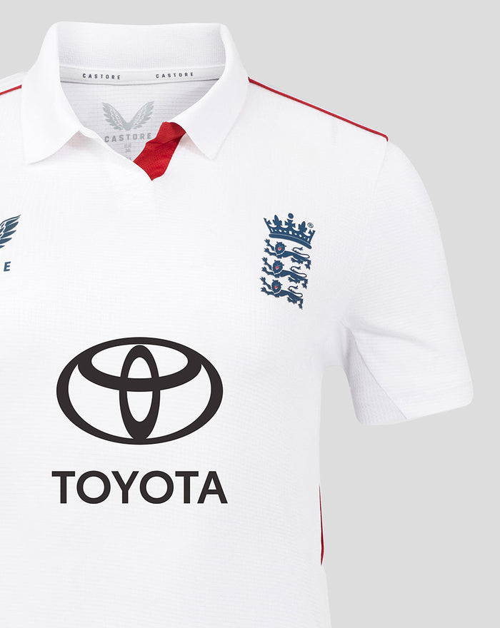 White ECB women's Pro Test cricket shirt with England crest on the chest Toyota sponsor logo and red shoulder piping