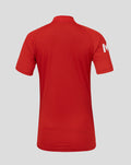 Back view of red ECB Women's 25/26 T20 Pro short sleeve shirt with a white sleeve logo