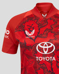 Red ECB women's 25/26 T20 Pro short sleeve cricket shirt with bold graphic pattern and Toyota sponsor logo