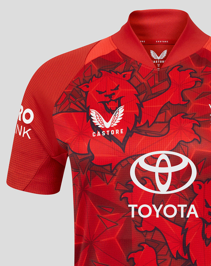 Red ECB women's 25/26 T20 Pro short sleeve cricket shirt with bold graphic pattern and Toyota sponsor logo