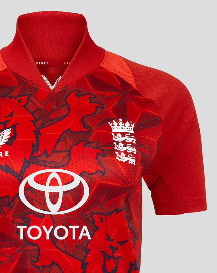 Front view of red ECB Women's 25/26 T20 replica shirt with bold graphic pattern and Toyota logo
