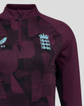 Front view of ECB 1/4 zip training top with light blue Castore wing logo and England crest on purple pattern.