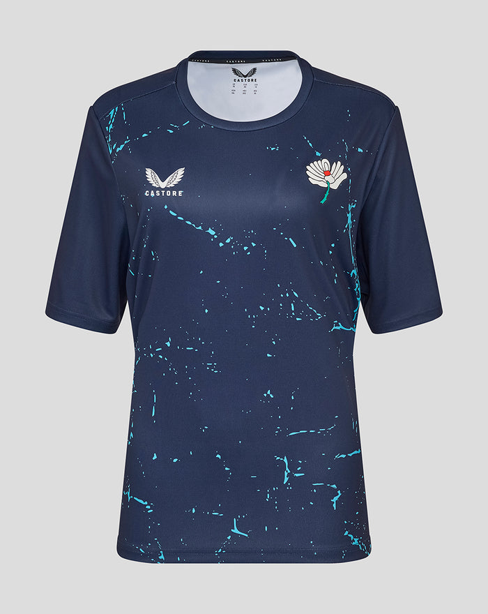 Front view of navy Yorkshire graphic training jersey for women with teal splatter pattern and white crest and flower logos.