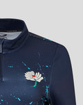Navy Yorkshire Graphic 1/4 Zip Top close up showing Castore logo on left chest and floral emblem on right chest with teal splatters