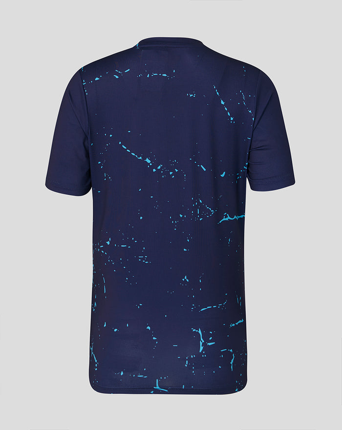Back view of navy peacoat women's short sleeve performance tee with turquoise splatter design.