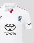 Front view of white England cricket shirt with Toyota logo across chest and crest on left chest.