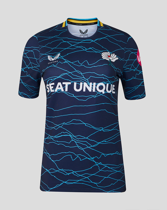 Women's navy blue 26/27 T20 short sleeve jersey with a light blue wave pattern and SEAT UNIQUE across the chest.