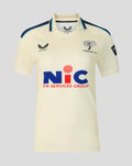 Cream county cricket jersey front view with navy trim and NIC sponsor logo