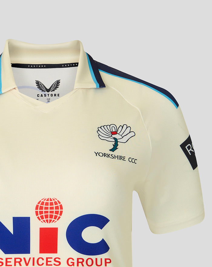Cream County Championship short sleeve jersey with Yorkshire CCC crest on chest blue shoulder stripes and Rothesay sponsor.