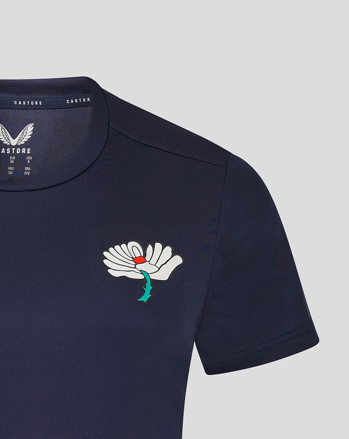 Navy Womens Yorkshire Short Sleeve Training Tee front with white flower emblem and green stem on left chest