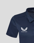 Close up of navy Yorkshire training polo short sleeve showing textured polyester fabric and white wing crest on chest