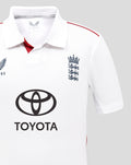 Front view of white ECB Junior Test Replica shirt with Castore wing logo on left chest, England crest on right chest, and Toyota sponsor in the center.