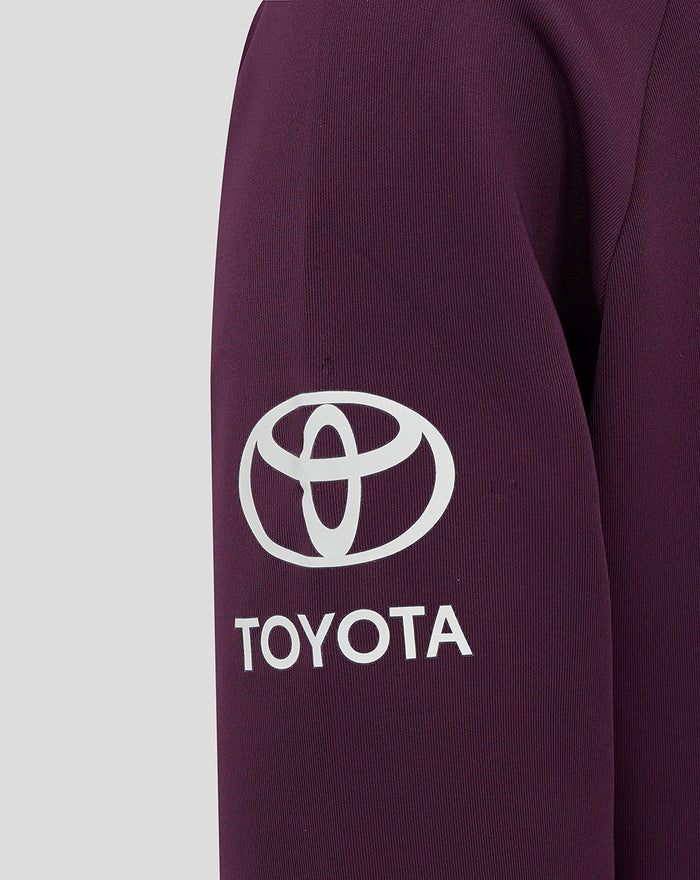 Purple ECB Junior training hoody sleeve with a white Toyota logo.