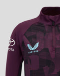 Close-up of upper chest and shoulder of the ECB Junior 25/26 1/4 Zip Training Top with purple geometric pattern and light blue England crest