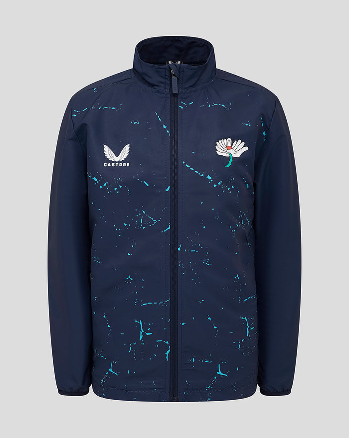 Front view of navy juniors Yorkshire graphic track jacket with teal paint splatters and chest logos