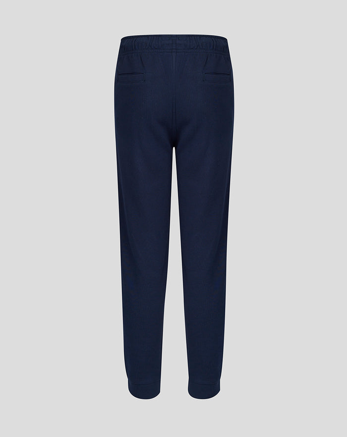 Back view of navy Junior 26/27 joggers with rear welt pockets and elastic cuffs.