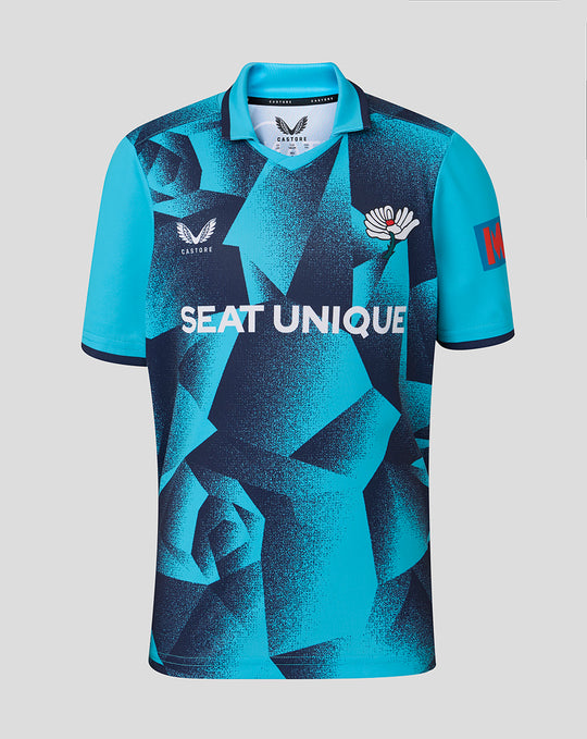 Front view of Junior 26/27 OD Short Sleeve Jersey - Aqiarius in blue geometric pattern with Seat Unique logo across the chest