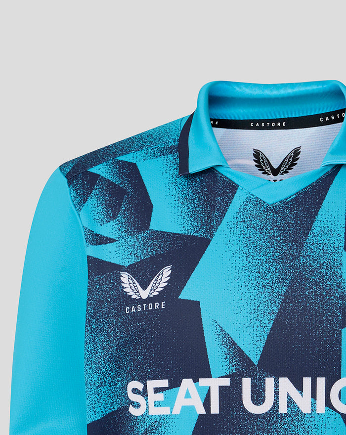 Junior 26/27 OD Long Sleeve Jersey in bright aqua with bold navy geometric print and club crest on the chest