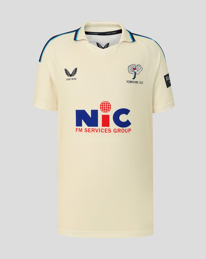 Cream County Champs short sleeve cricket jersey with blue piping on shoulders and collar, crest on chest and NIC sponsor logo across the front