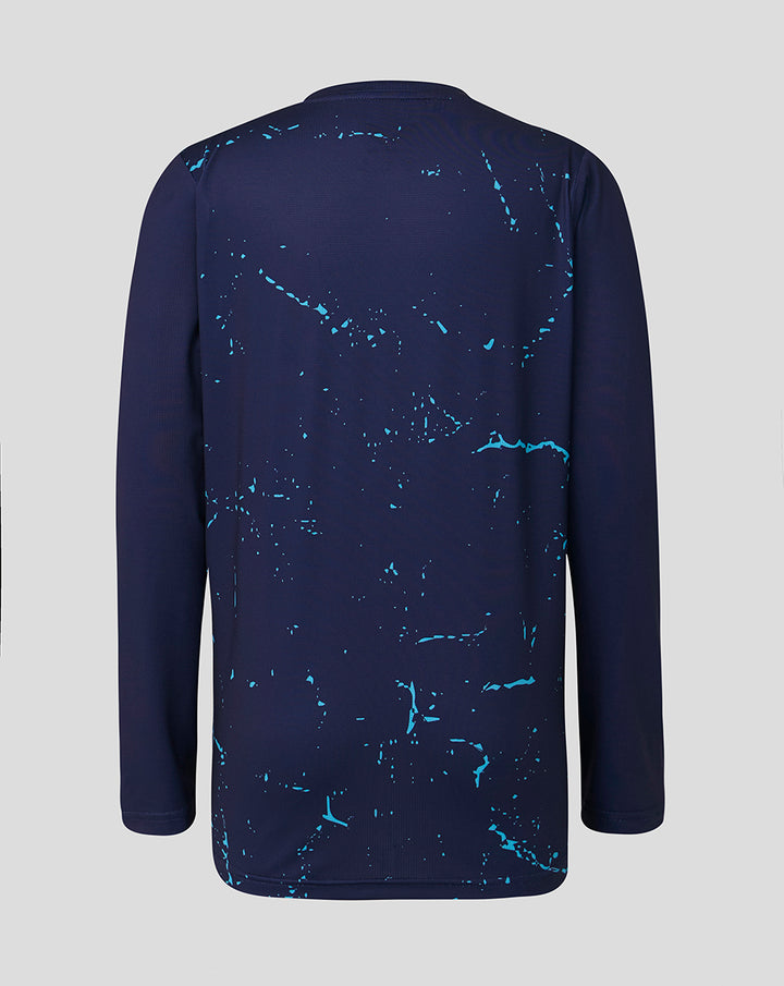 Back view of Junior 26/27 Long Sleeve Performance T-Shirt in peacoat with blue splash design