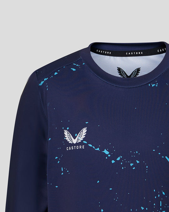 Navy peacoat junior long sleeve performance tee with light blue splatter and Castore crest on chest
