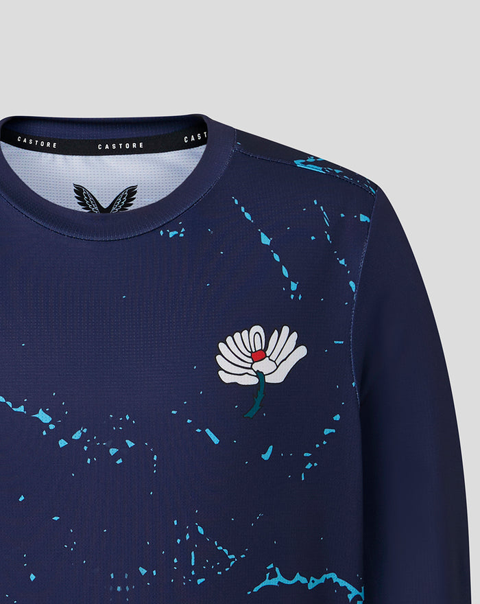 Navy junior long sleeve performance tee with White Rose crest and blue splatter across chest