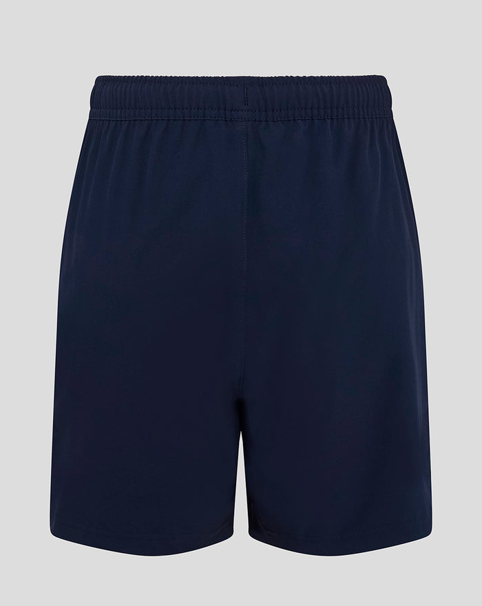 Back view of navy woven training short with elastic waistband