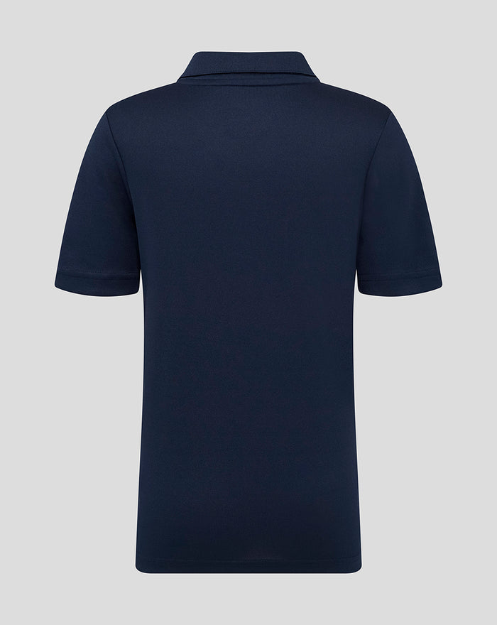 Back view of navy juniors short sleeve training polo with a clean plain design and no visible logos.