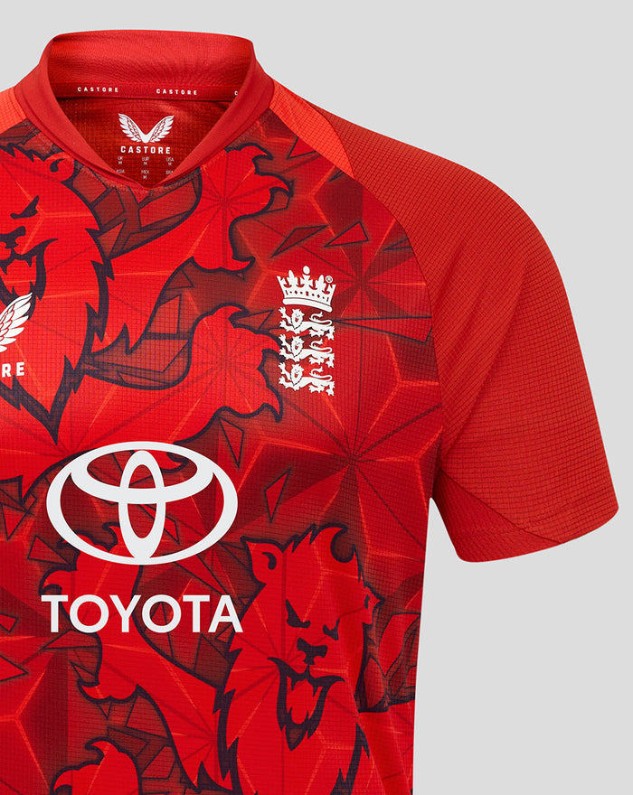 Red England cricket T20 Pro Shirt with bold geometric pattern, white team crest on the chest and Toyota sponsor logo across the front