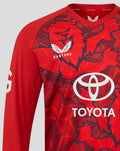 Red ECB Men's 25/26 T20 sweater chest area featuring Toyota sponsor and bold leaf pattern.