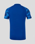 Back view of royal blue ECB ODI Pro Short Sleeve Shirt with camo patterned sleeves