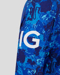Close up of blue camo ECB Odi Sweater sleeve with bold white lettering