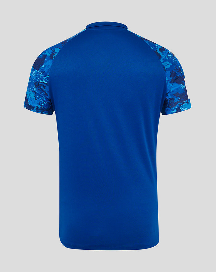 Back view of a blue England ODI replica short sleeve shirt with camo sleeves and solid body.