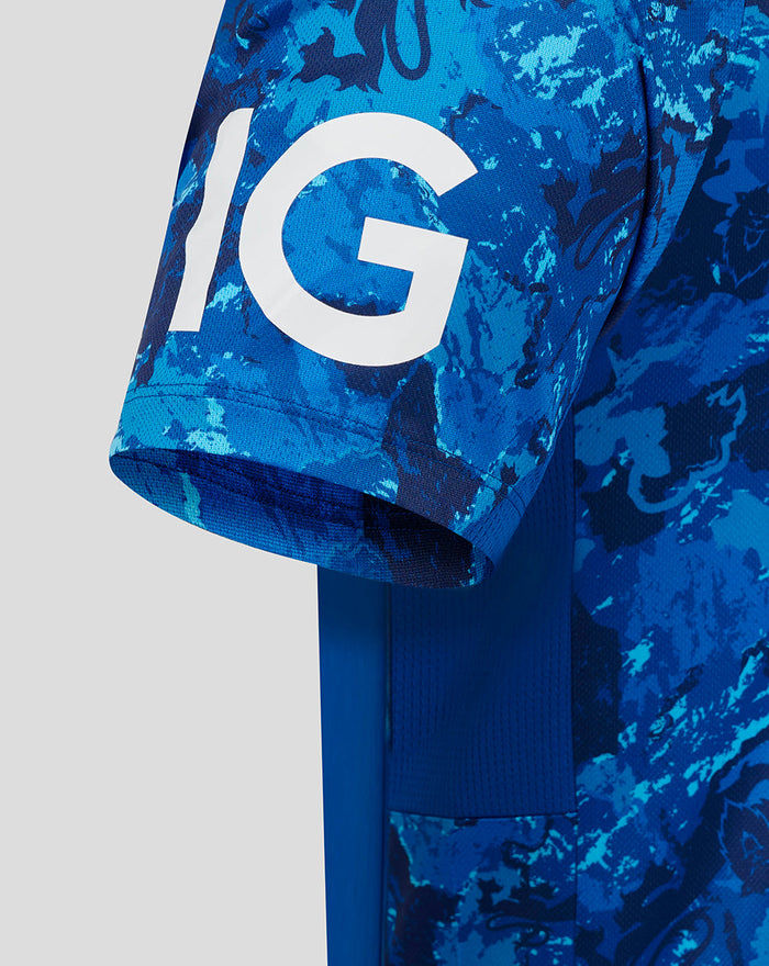 Close-up of blue camouflage ODI shirt sleeve with a large white graphic on the hem
